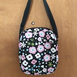 Le Sportsac Adjustable shoulder travel bag.